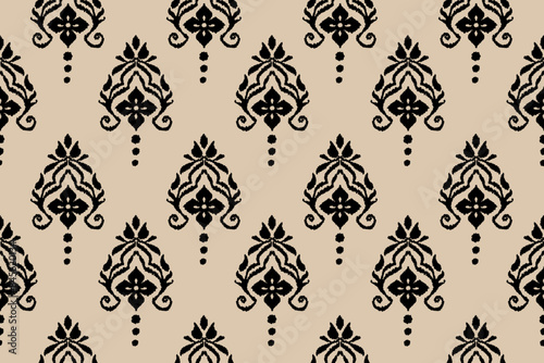 Ikat paisley embroidery on the fabric in Indonesia,India and asian countries.geometric ethnic oriental seamless pattern.Aztec style. Background, design for texture,fabric,clothing,wrapping,textile