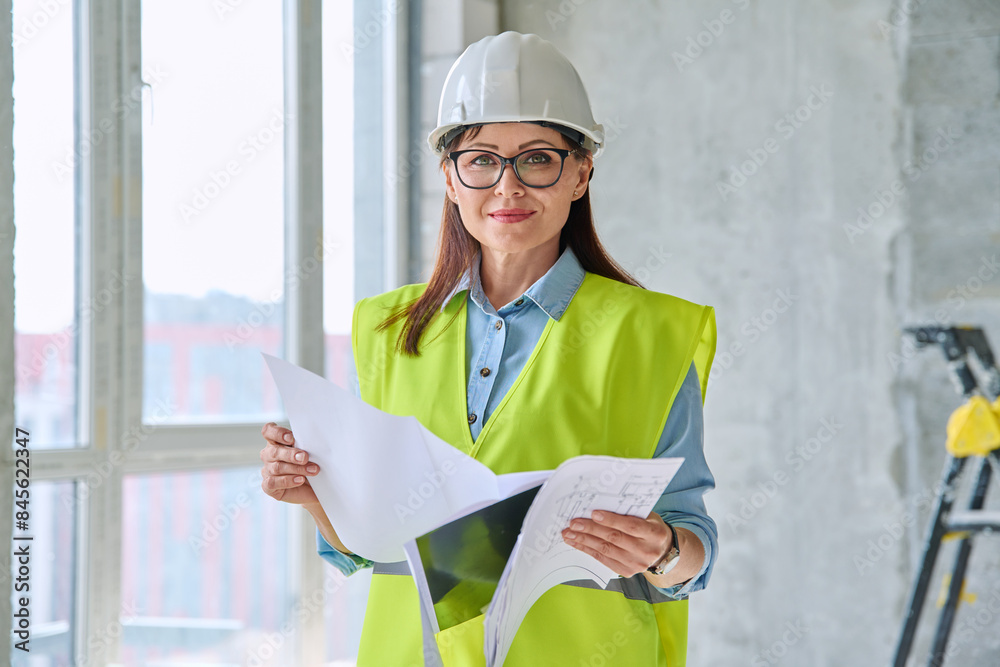 Portrait of woman builder engineer supervisor at construction Portrait of woman builder engineer supervisor at construction