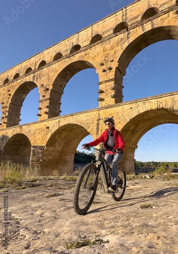 senior woman mountainbiking...