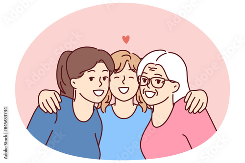 Family portrait of three female generations with teenage girl lovingly hugging mother and grandmother. Happy women of different generations spend time together enjoying family vacation
