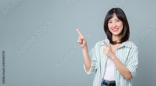Business, finance and employment, female successful entrepreneurs pointing finger concept. Successful female businesswoman, asian real estate broker pointing finger, showing number one and smiling photo