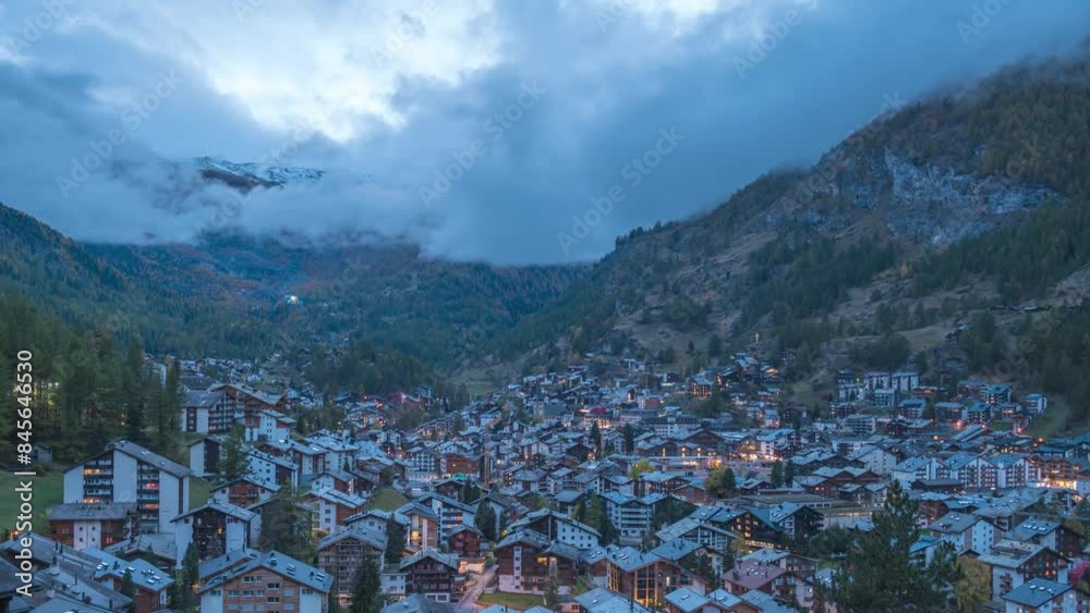 Zermatt Switzerland time lapse, city skyline day to night timelapse at Zermatt city Valley and famous Matterhorn mountain peak