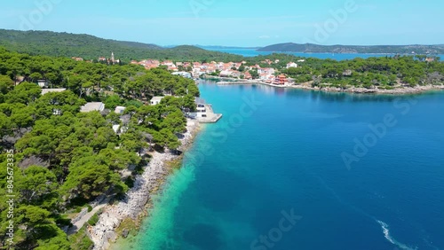 Božava (Bozava) is a charming village located on Dugi Otok, Croatia, perfect for a serene summer getaway captured by drone photo