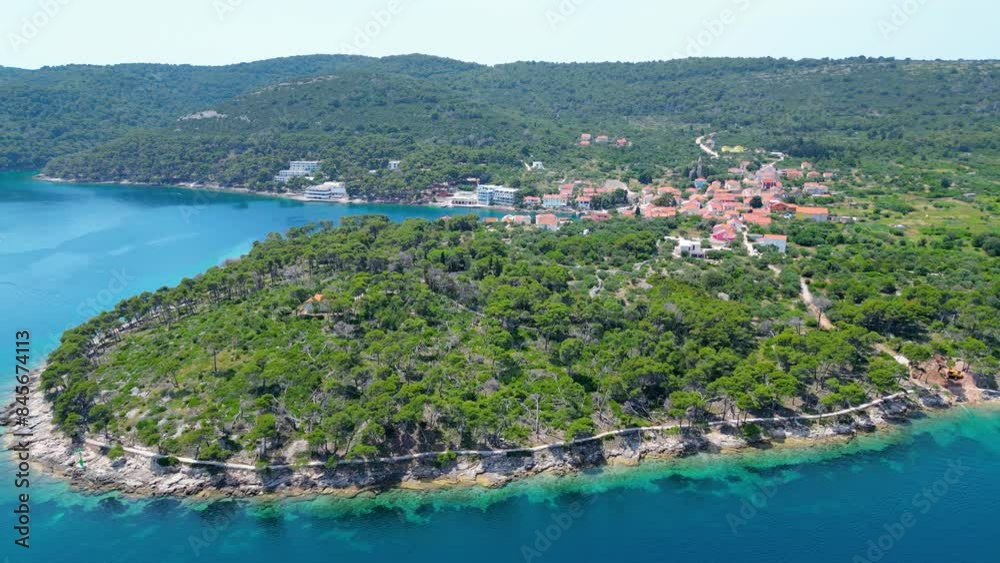 Božava (Bozava) is a charming village located on Dugi Otok, Croatia, perfect for a serene summer getaway captured by drone