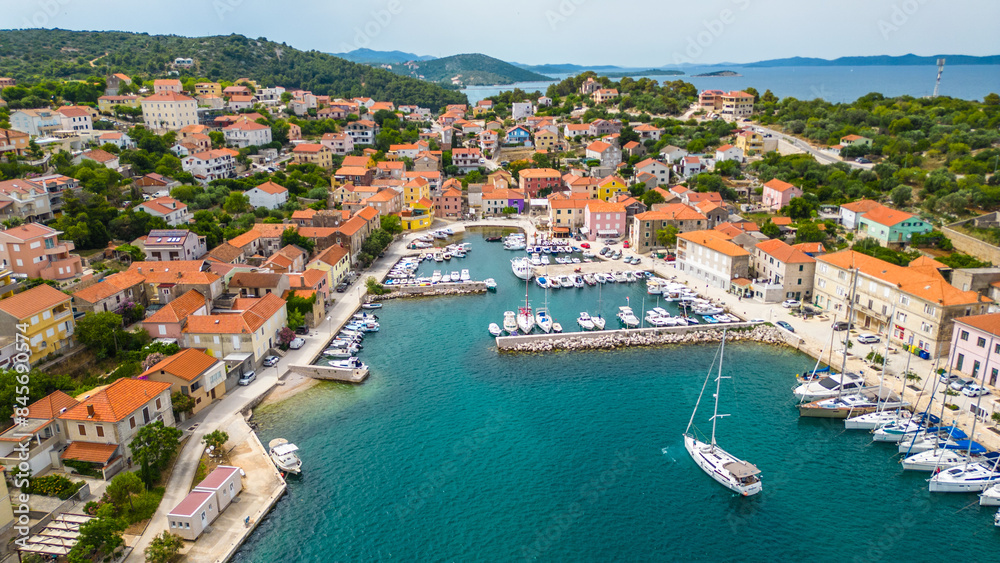 Sali is a picturesque village located on the island of Dugi Otok, Croatia, known for its charming harbor and serene coastal atmosphere captured by drone Sali is a picturesque village located on the island of Dugi Otok, Croatia, known for its charming harbor and serene coastal atmosphere captured by drone