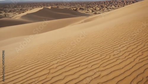 Sand dunes with wavy pattern. Desert landscape. photo