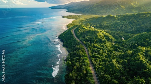 A breathtaking aerial view of a cliff above the ocean with stunning natural landscape, water merging with the sky, and terrestrial plants lining the beach AIG50