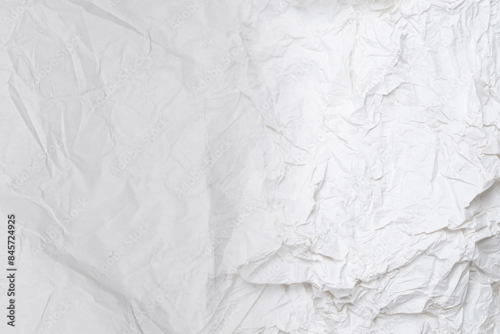 Fototapeta premium Crumpled white paper background.