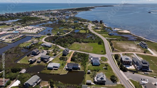Φωτογραφία Living in homes by the coast with beach and blue water in Hatteras, North Caroli