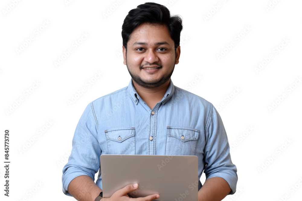Smiling mid-age Indian man using a laptop. Smiling mid-age Indian man using a laptop.