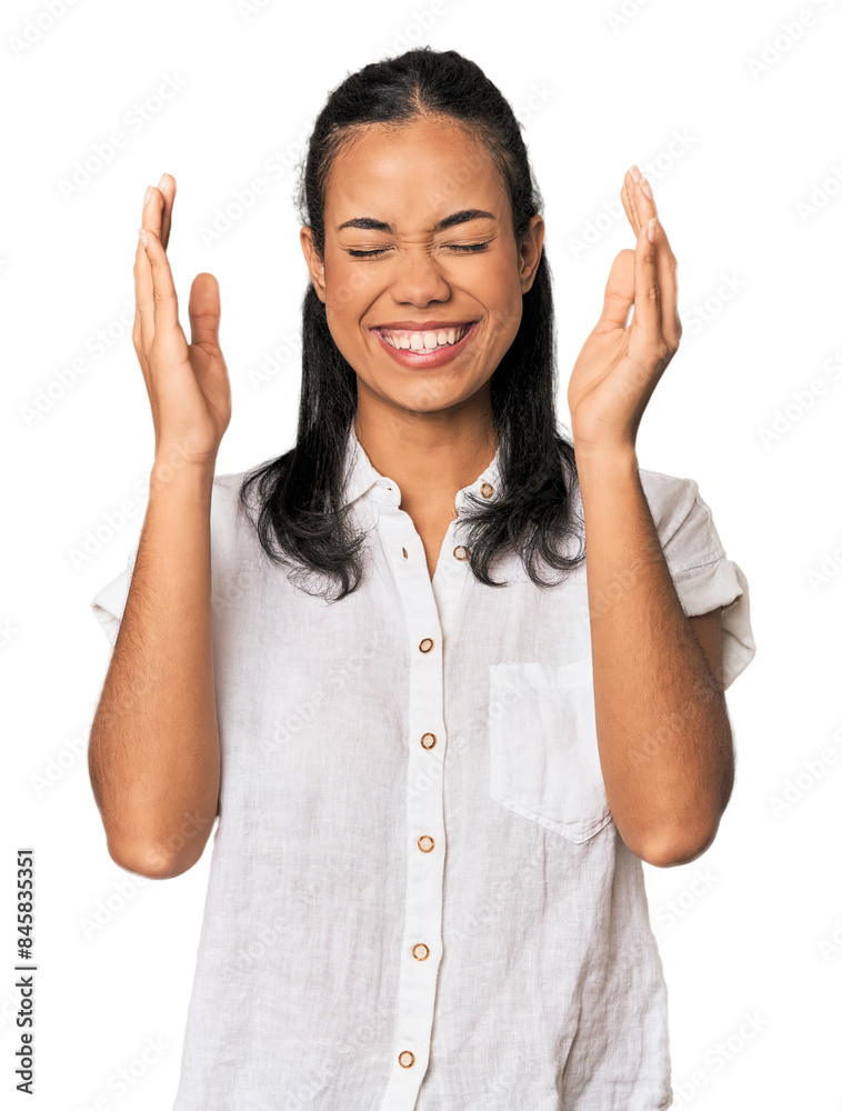 Young Filipina woman joyful laughing a lot. Happiness concept. Young Filipina woman joyful laughing a lot. Happiness concept.