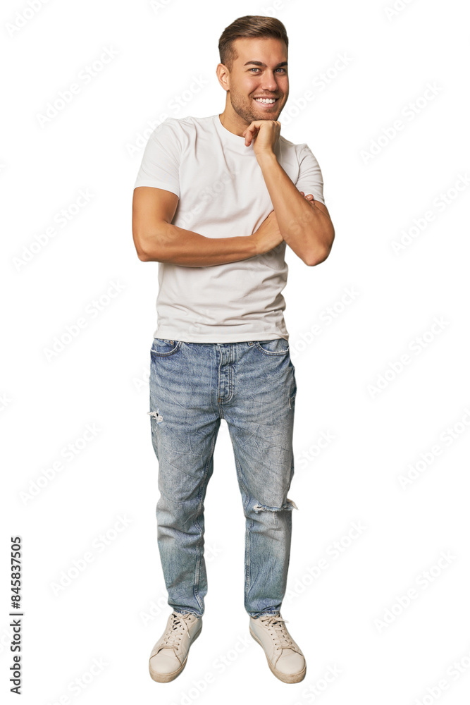 Full body portrait of a man in studio smiling happy and confident, touching chin with hand. Full body portrait of a man in studio smiling happy and confident, touching chin with hand.