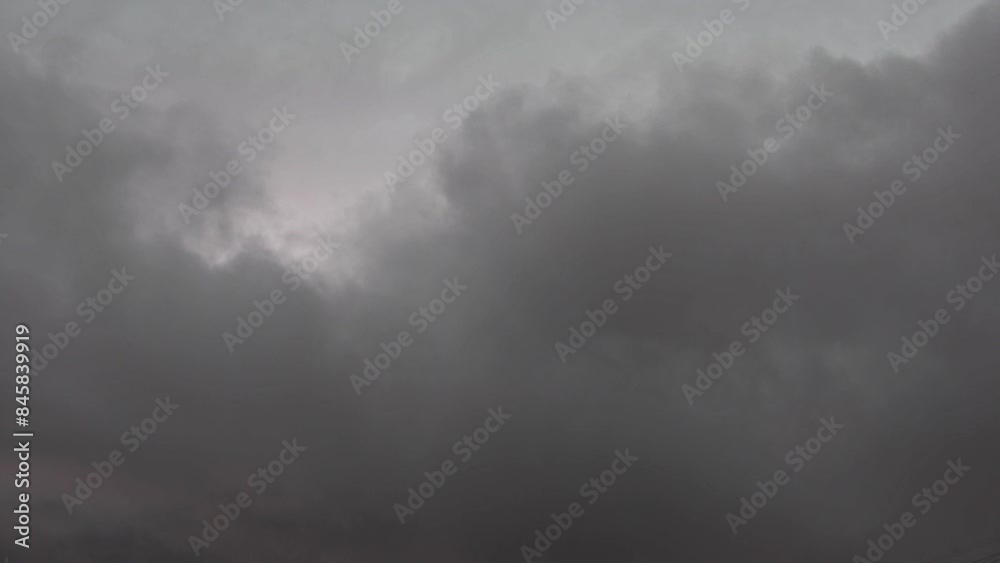 Stormy sky with gray clouds quikly passing. Strong wind. Before the rain. Stormy weather. Stormy sky with gray clouds quikly passing. Strong wind. Before the rain. Stormy weather.