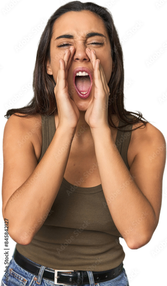 Hispanic young woman shouting excited to front. Hispanic young woman shouting excited to front.