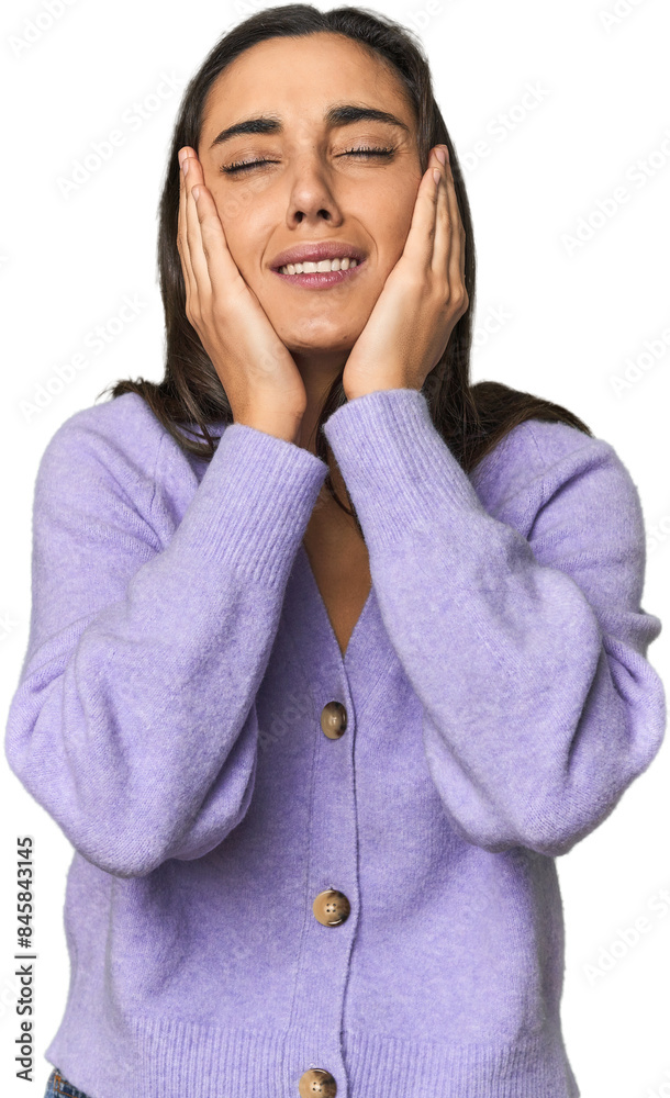 Hispanic young woman crying, unhappy with something, agony and confusion concept.