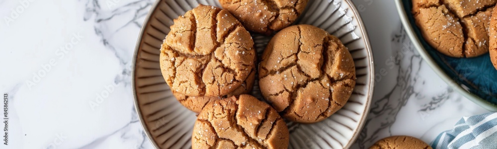 Some peanut butter blossom cookies, sugar food background 
