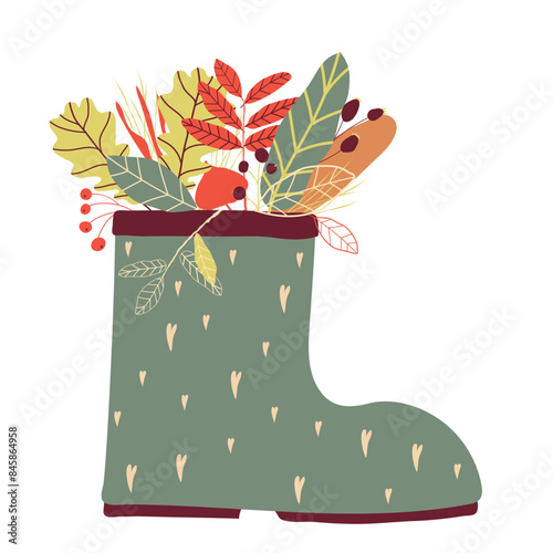 Autumn. Rubber boots with bright autumn leaves inside. Vector illustration. Flat design.