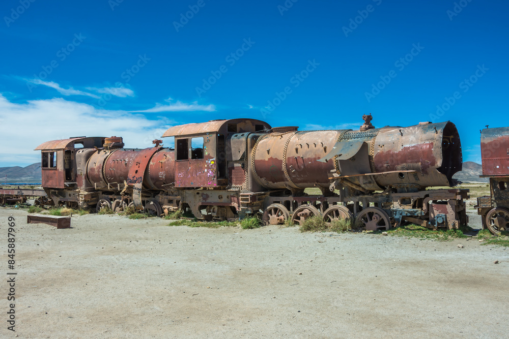 Naklejka premium Uyuni, Bolivia -March-31-2024: view of the famous Cementerio de Trenes (Train Cementery)