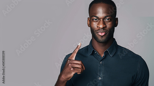 businessman afor american pointing with finger photo