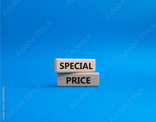 Special Price symbol. Concept word Special Price on wooden blocks. Beautiful blue background. Business and Special Price concept. Copy space
