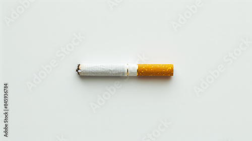 A cigarette is lit and has a red tip. The cigarette is on a white background. Scene is one of caution and warning, as smoking is known to be harmful to one's health