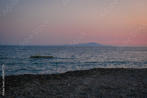 Fototapeta Naklejka Na Ścianę i Meble -  Sea view from the beach at sunset.