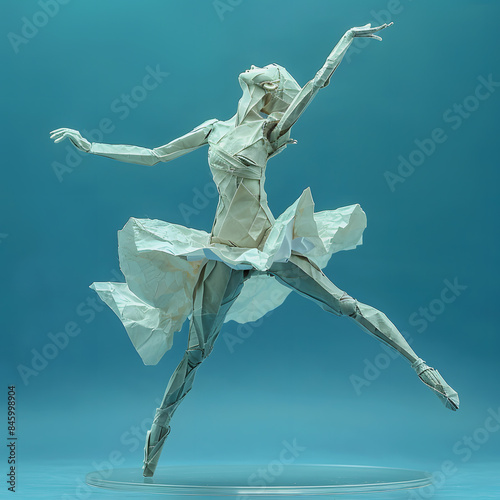 Beautiful ballerina, dancer, thin flexible girl in a dress. Figure made of crumpled paper on blue background, unusual creative illustration photo