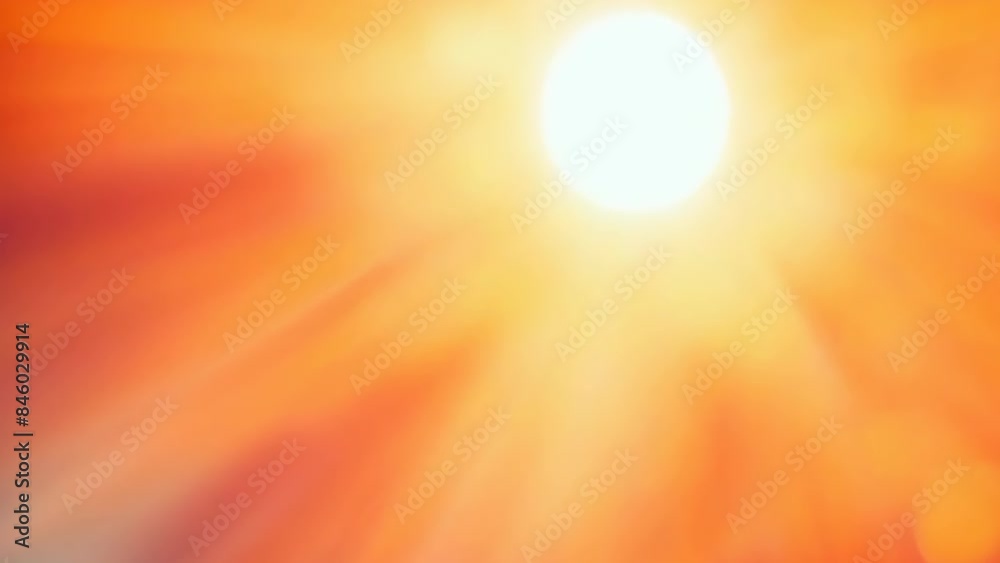 A captivating image of glowing sun rays in the evening sky, painted with warm orange and yellow hues. The light scatters through, creating a serene and warm