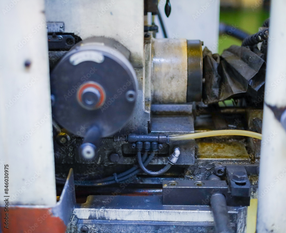 An equipment of machine. Mechanical part in the manufacturing. An equipment of machine. Mechanical part in the manufacturing.