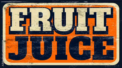 Aged and worn fruit juice sign on wood