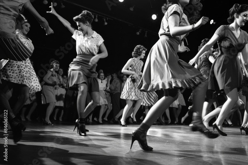 The twist - an iconic dance phenomenon originating in the late 1950s, defined by dynamic leg and body motions, spins, and jumps, set to the beat of rock and roll or rhythm and blues music