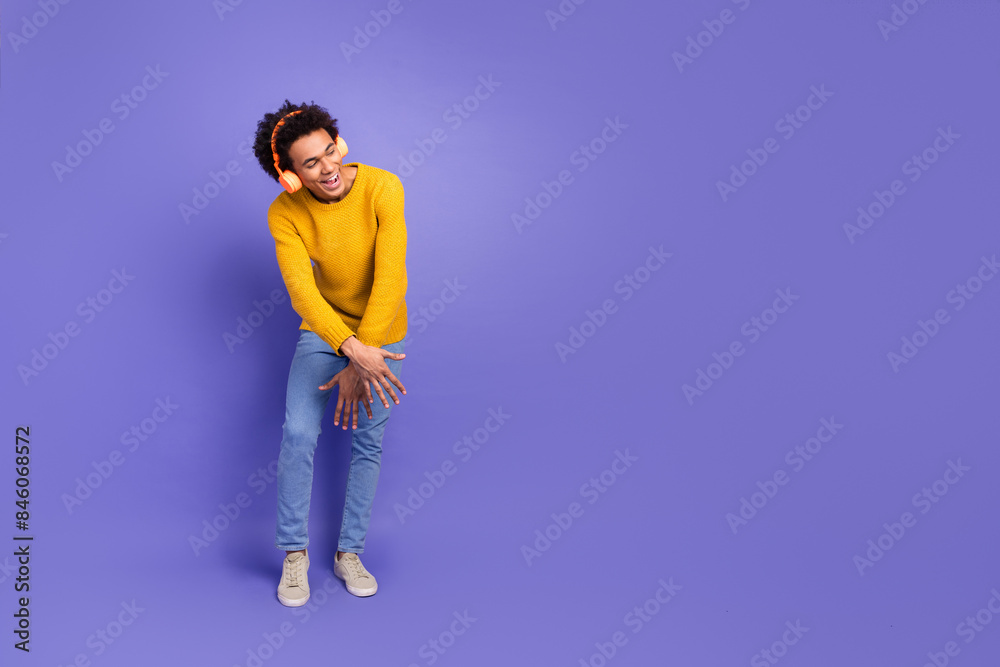 Photo of cheerful positive nice man wear stylish yellow clothes have fun look empty space isolated on purple color background Photo of cheerful positive nice man wear stylish yellow clothes have fun look empty space isolated on purple color background