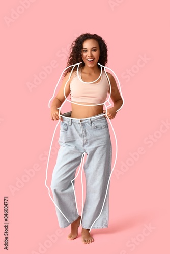 Happy young woman in loose ...