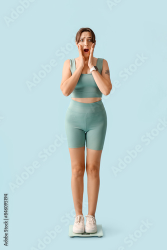 Beautiful shocked woman wit...