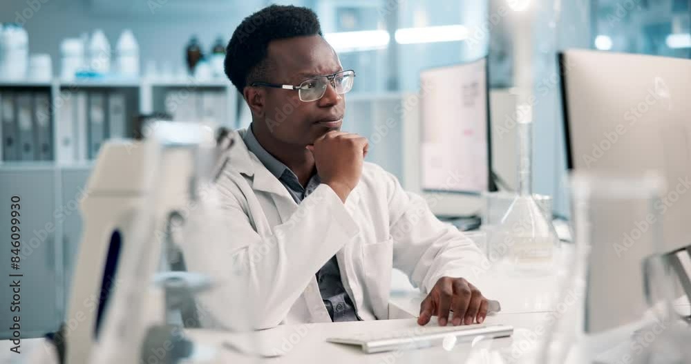 Science, thinking and black man in laboratory with computer for results, test and medical study. Technology, scientist or lab technician reading web review, report or data on pharmaceutical research
