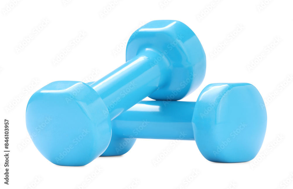Light blue dumbbells isolated on white. Sports equipment Light blue dumbbells isolated on white. Sports equipment