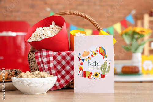 Wicket basket with popcorn,...
