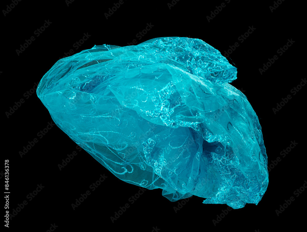 Blue Lace fabric flying in curve shape, Piece of textile Blue Lace fabric throw fall in air. Black background isolated motion blur Blue Lace fabric flying in curve shape, Piece of textile Blue Lace fabric throw fall in air. Black background isolated motion blur