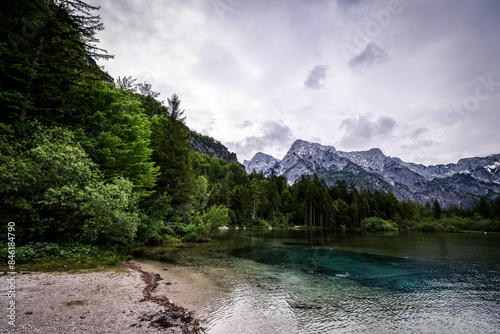 A beautiful view on the Ehrwalder Almsee and the Zugspitze on a sunny summer day in Austria. langbathsee mit spiegelndem brunnkogel. Ausblick über Ehrwald zum Zugspitzmassiv photo