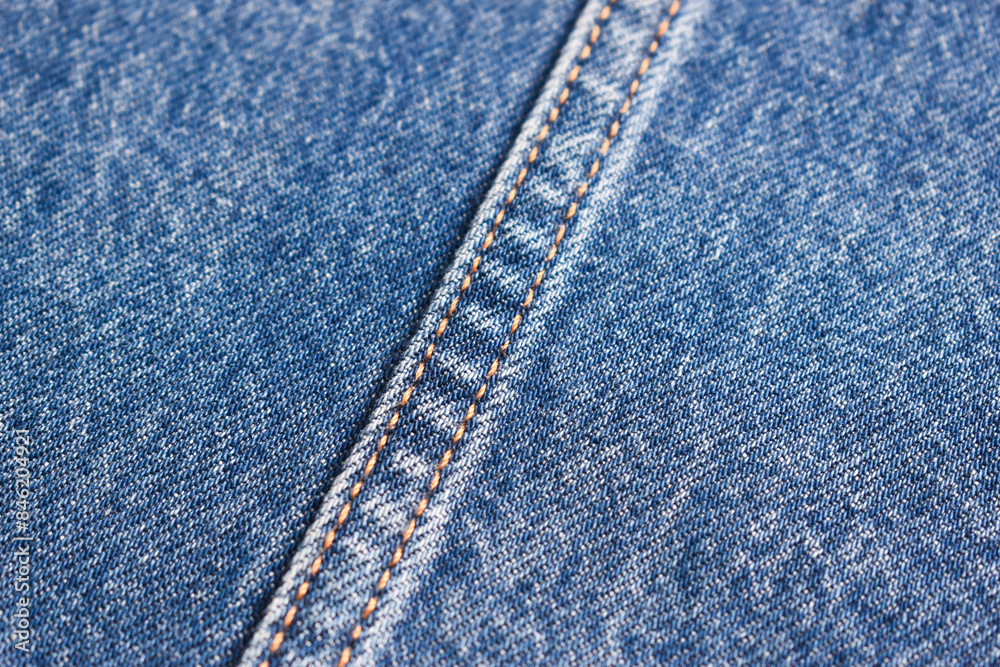 seam of blue denim texture background, jean fashion style seam of blue denim texture background, jean fashion style