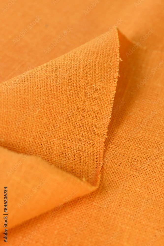 Obraz premium orange hemp viscose natural fabric cloth color, sackcloth rough texture of textile fashion abstract background