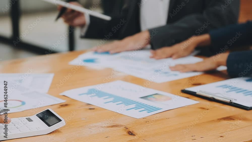 Team of business people are meeting to analyze data for marketing plan,Market research reports and income statistics, Financial and Accounting concept.