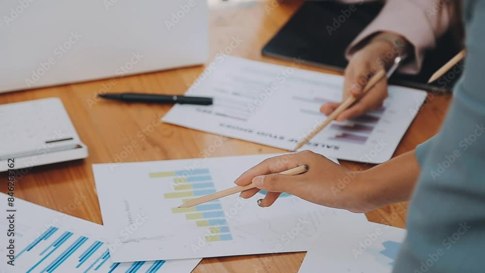Team of business people are meeting to analyze data for marketing plan,Market research reports and income statistics, Financial and Accounting concept. Team of business people are meeting to analyze data for marketing plan,Market research reports and income statistics, Financial and Accounting concept.