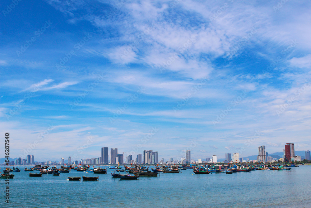 Stunning panoramic photography capturing the expansive and vibrant cityscape of Da Nang, Vietnam. Highlights include the Han River, iconic bridges, and urban skyline set against a backdrop of mountain Stunning panoramic photography capturing the expansive and vibrant cityscape of Da Nang, Vietnam. Highlights include the Han River, iconic bridges, and urban skyline set against a backdrop of mountain