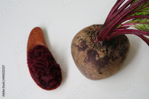 Organic beetroot pulp juice fruits or beet juice dregs. Can be used for face mask for healthy skin care. squeezed from a slow juicer, zero waste. Fresh beet fruit on the side. photo