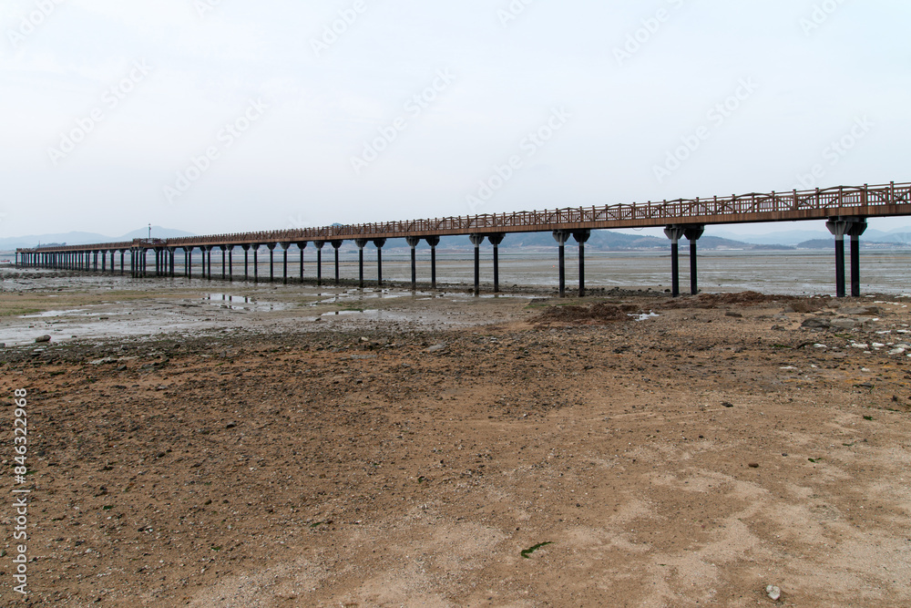 View of the wooden bridge on the beach