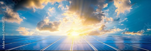 Solar Panels and Sunburst Harnessing Renewable Solar Energy from a Clear Sky. The technology of photovoltaics captures sunlight, providing clean and sustainable power for a greener future photo