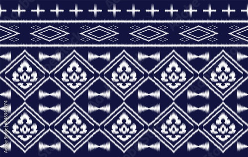 Ikat motifs ethnic fabric seamless pattern blue. traditional ikat ethnic pattern style. Designed for saree, sarong, batik ,carpet ,clothing ,ikat pattern ,fabric ,embroidery ,textile art ,weaving