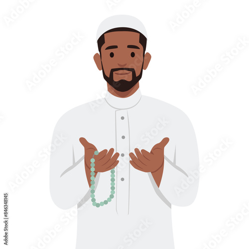 Young muslim man praying while holding rosary beads. Flat vector illustration isolated on white background