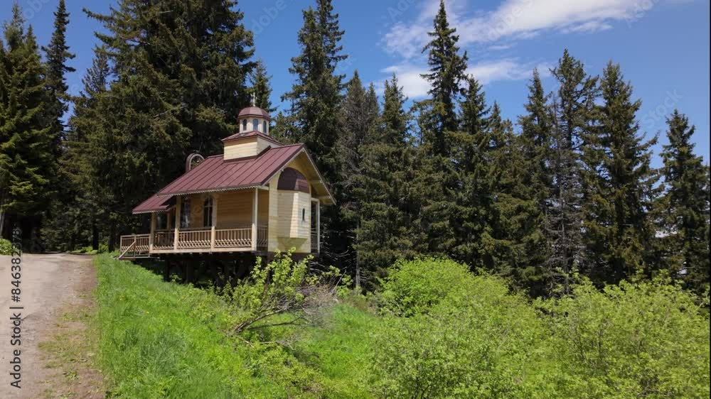 A wooden chapel near a mountain path. The orthodox chapel in Vitosha moutnain, Bulgaria, 'параклис Свето Преображение Господне' translating to Chapel of the Holy Transfiguration of the Lord A wooden chapel near a mountain path. The orthodox chapel in Vitosha moutnain, Bulgaria, 'параклис Свето Преображение Господне' translating to Chapel of the Holy Transfiguration of the Lord